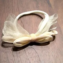 【美品】ベビー用クリーム色リボン付きヘアバンド