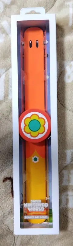 パワーアップバンド オレンジ 花モチーフ