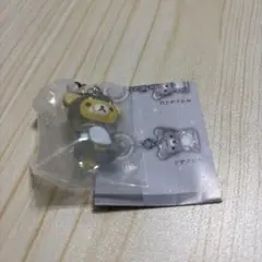 リラックマ　きょうりゅう着ぐるみフィギュア　めじるしアクセサリー　リラックマ