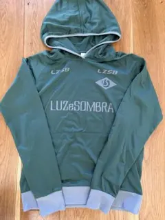 Luz e Sombra フード付きウェア グリーン