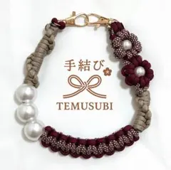 パラコード ねじねじ スマホハンドストラップ パール 花 エンジ 大振り 可愛い