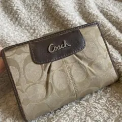 Coach 二つ折り財布 ベージュ　ブラウン　シグネチャー