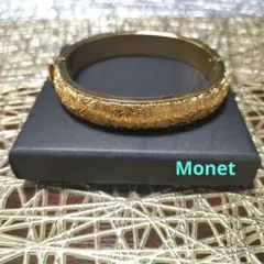 モネ Monet ゴールドカラー ワイドバングル ブレスレット - メルカリ