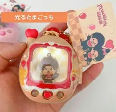 光る もんちっち たまごっち キーホルダー イエロー - メルカリ