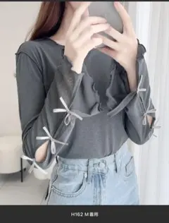 袖リボンスラブシアージャガードプルオーバー mily bilet