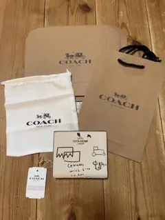 【新品、未使用】COACH コーチ バスキア 二つ折り財布