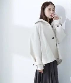 ナチュラルビューティーベーシック スタンドネックハーフコート オフベージュ M