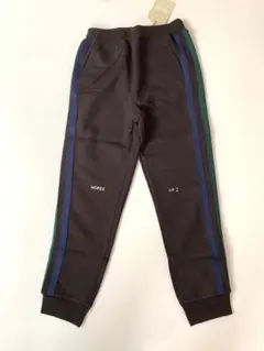 新品 タグ付き DILASH 黒　スウェット ジャージ　130 ライン　男の子のサムネイル