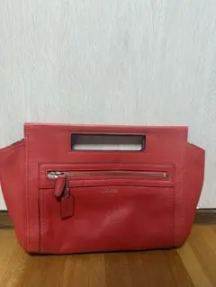COACH オレンジ レザーハンドバッグ
