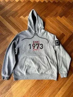 グレー パーカー EST. 1973