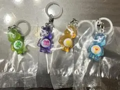 【新品】ケアベア　クリアマスコットチャーム2 めじるしアクセサリー　４点セット