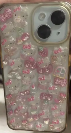 iPhone15用ケース ハローキティ ピンク　ボンボンドロップシール