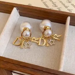 Dior Tribales ピアス パール スター ロゴ - メルカリ