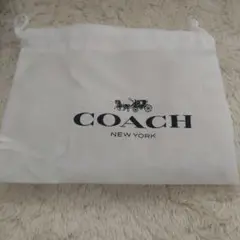 COACH ロゴ入り不織布バッグ