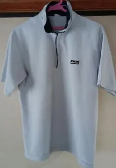 ellesse エレッセ ハーフジップ ポロシャツ ライトブルーのサムネイル