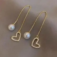 揺れる ハートチェーンピアス ゴールド 華やか 高見え