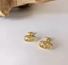 ゴールド　ピアス　トリオンフ