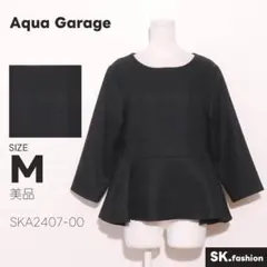美品 Aqua Garage トップス ブラウス　長袖　ペプラム　後ろジップのサムネイル