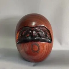 木製卵型置物 顔の彫刻