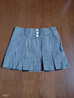 FILA GOLFミニスカート　レディスSボックスプリーツ黒☓白ギンガムチェック