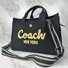 COACHコーチ大容量34cmボウリボンモチーフカーゴトートバッグ - メルカリ