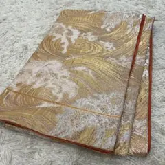 袋帯 金銀波模様 オレンジ裏地