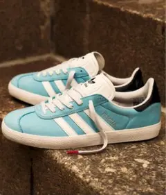 adidas アディダスオリジナルス MNUFC × ファミリア ガゼル