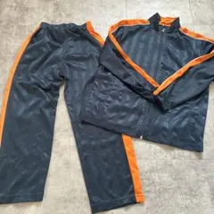 黒とオレンジジャージ上下セット140センチ