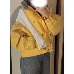 ellesse ライダース風　イエロー グレー 中綿ジャケットのサムネイル