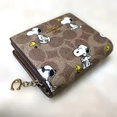 コーチ　スヌーピー　コラボ　二つ折り財布　シグネチャー