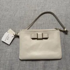 コーチcoachレアホワイトレザーリボンポーチ 新品タグ付き