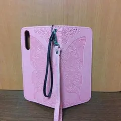 蝶エンボスデザイン ピンク フリップケース中古