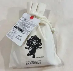 【未開封新品】 黒ミャクミャク プリント付き巾着 クッキー入り