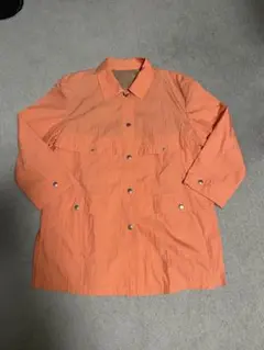 オレンジ ボタン留め アウター