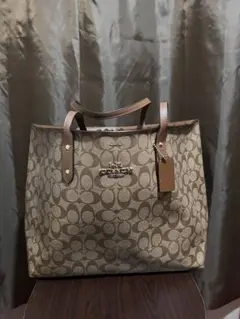 COACH ベージュ ロゴトートバッグ