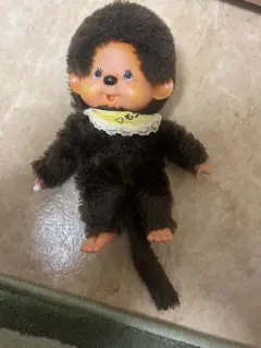 セキグチ製のレトロモンチッチ ブルーアイで黄色のスタイを付けた可愛いぬいぐるみ。