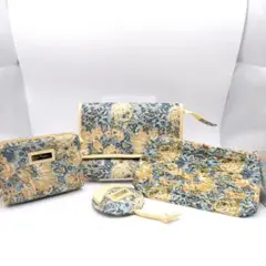 ほぼ未使用　ジムトンプソン　ポーチセット　タイシルク　花柄　イエローのサムネイル