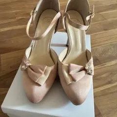 リボン付きピンク高ヒールパンプス