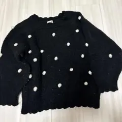 プティマイン　ポンポン付き黒長袖ニット