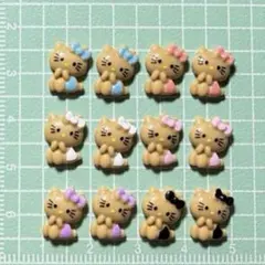 No.902 日焼けハローキティ ピンクイルカ ネイルパーツ5個 - メルカリ