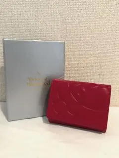 未使用 Vivienne Westwood 折財布 エンジ シンプルがま口 定番 Vivienne Westwood（ヴィヴィアンウエストウッド） FLORENCE 財布 二