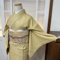き*ち様 色無地　袷　正絹　一ツ紋　草花地紋　黄朽葉色　身丈158.5裄64.5