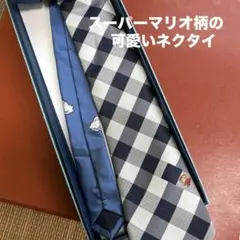 ★お値下げ　スーパーマリオ　チェック柄 ネクタイ 雲柄 ブルー★のサムネイル