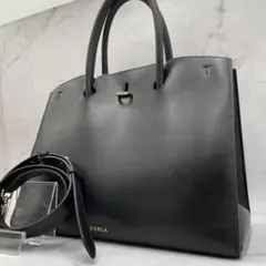 美品✨フルラ　ジェネシー　2way ショルダーバッグ　ターンロック　現行ロゴ　紺 FURLA フルラ バッグ レディース ショルダーバッグ 2way 斜