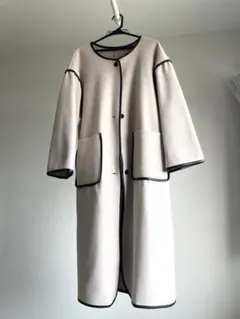 ベージュ ロングコート ポケット付き