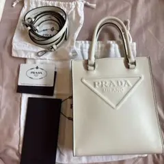 PRADA トライアングル 2WAY ハンドバッグ レザー アイボリー - メルカリ