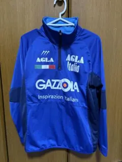 AGLA ピステ・ウィンドブレーカー Lサイズ 青のサムネイル