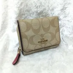 コーチ 三つ折り 財布 ミニ財布 シグネチャー ベージュ ピンク