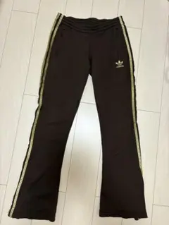 adidas アディダス サイドラインロゴ トラックパンツ ブラウンゴールド