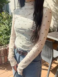 アイボリー シアー トップス フリルネック 小さなリボン 長袖カットソー L